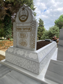 MHP Genel Başkanı Bahçeli, Ferdi Tayfur'un kabrini yaptırdı