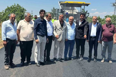 Yoğun yağış döneminde tahrip olan yollar asfaltlandı, vatandaşlar adak kurbanı kesti

