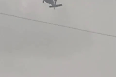 Askeri helikopter dolu ve yağmura yakalandı
