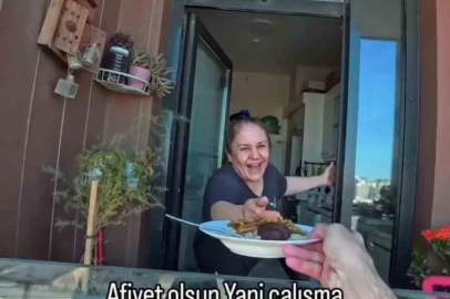 100 metre yükseklikte gökdelen temizliği yapanlara köfte, patates, pilav ikramı
