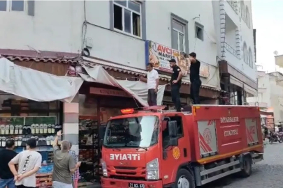 İş yerinde mahsur kalan kedi için itfaiye ekipleri seferber oldu
